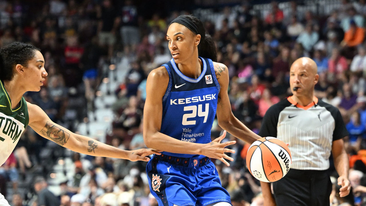 UNCASVILLE, CT - JUNE 17: DeWanna Bonner #24 of the Connecticut Sun handles the ball during the game against the Seattle Storm on June 17, 2022 at Mohegan Sun Arena in Uncasville, Connecticut. NOTE TO USER: User expressly acknowledges and agrees that, by downloading and/or using this Photograph, user is consenting to the terms and conditions of the Getty Images License Agreement. Mandatory Copyright Notice: Copyright 2022 NBAE
