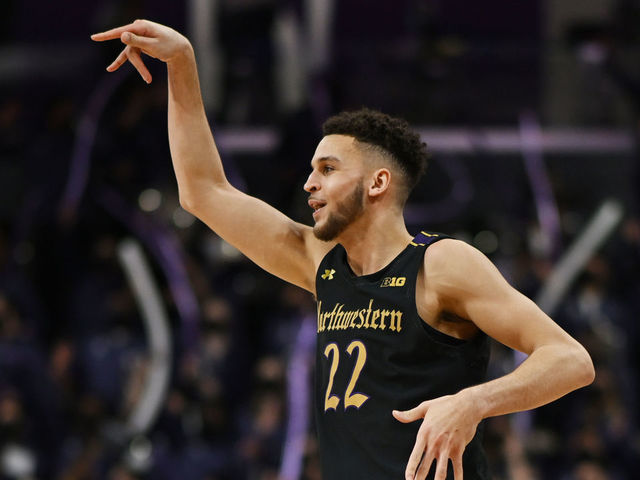 EVANSTON, ILLINOIS - JANUARY 29: Pete Nance #22 of the Northwestern Wildcats reacts after making a three point basket in the second half against the Illinois Fighting Illini at Welsh-Ryan Arena on January 29, 2022 in Evanston, Illinois.