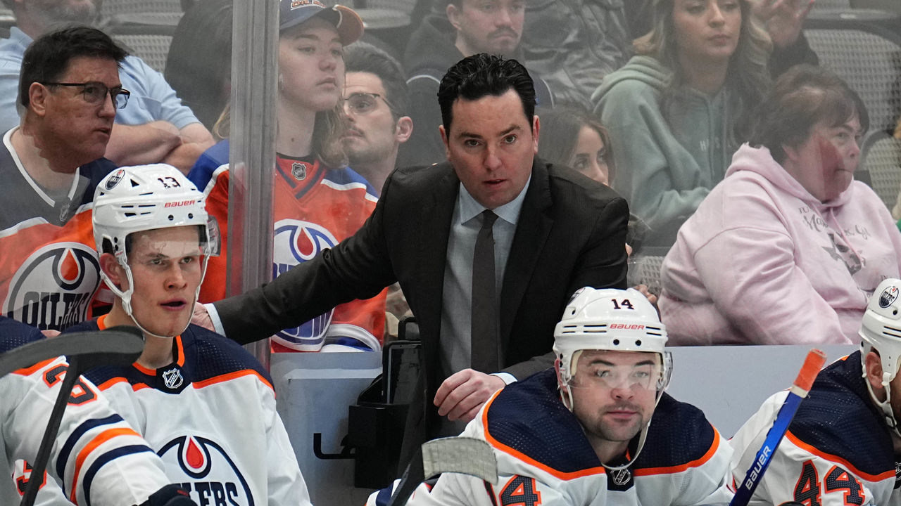 DALLAS, TX - MARCH 22: Jay Woodcroft of the Edmonton Oilers watches the action from behind the bench against the Dallas Stars at the American Airlines Center on March 22, 2022 in Dallas, Texas.