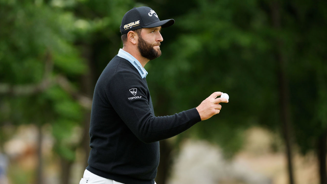 BROOKLINE, MASSACHUSETTS - JUNE 18: Jon Rahm of Spain waves on the 11th green during the third round of the 122nd U.S. Open Championship at The Country Club on June 18, 2022 in Brookline, Massachusetts.