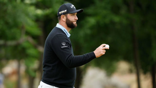 BROOKLINE, MASSACHUSETTS - JUNE 18: Jon Rahm of Spain waves on the 11th green during the third round of the 122nd U.S. Open Championship at The Country Club on June 18, 2022 in Brookline, Massachusetts.