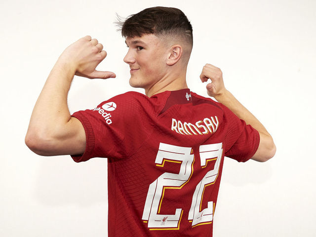 KIRKBY, ENGLAND - JUNE 19: New Liverpool signing Calvin Ramsey signs for the club at AXA Training Centre on June 19, 2022 in Kirkby, England.