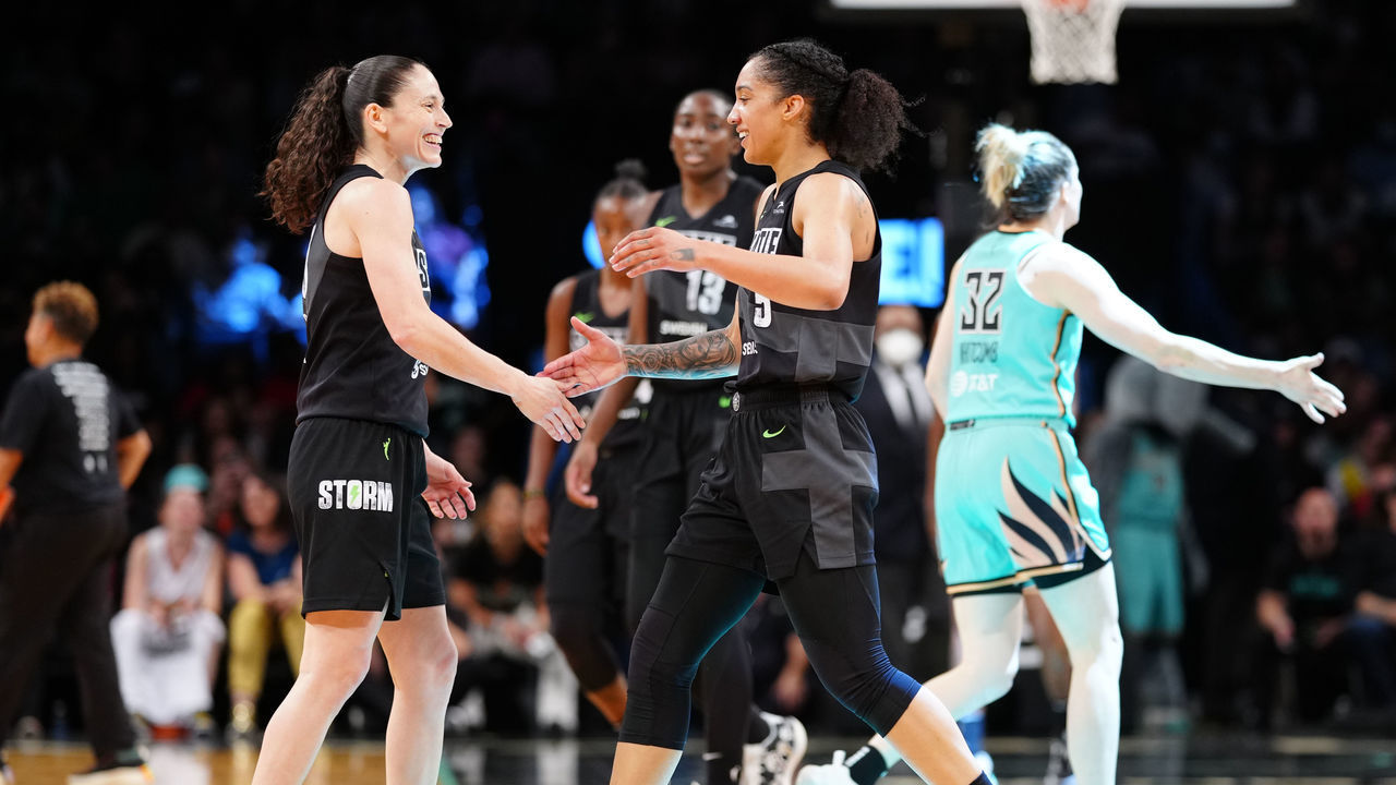 BROOKLYN, NY - JUNE 19: Sue Bird #10 hi-fives Gabby Williams #5 of the Seattle Storm during the game against the New York Liberty on June 19, 2022 at the Barclays Center in Brooklyn, New York. Mandatory Copyright Notice: Copyright 2022 NBAE