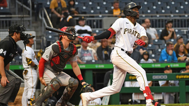 PITTSBURGH, PA - OCTOBER 03: Oneil Cruz #61 of the Pittsburgh Pirates hits a two run home run for his first Major League home run in the ninth inning during the game against the Cincinnati Reds at PNC Park on October 3, 2021 in Pittsburgh, Pennsylvania.
