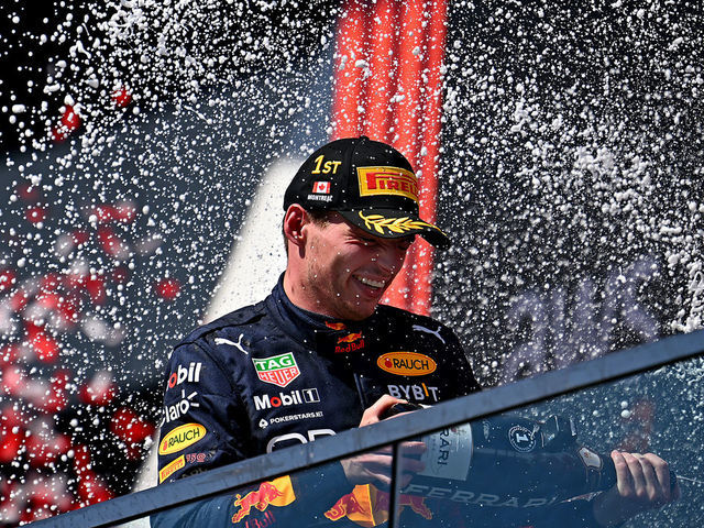 MONTREAL, QUEBEC - JUNE 19: Race winner Max Verstappen of the Netherlands and Oracle Red Bull Racing celebrates on the podium during the F1 Grand Prix of Canada at Circuit Gilles Villeneuve on June 19, 2022 in Montreal, Quebec.
