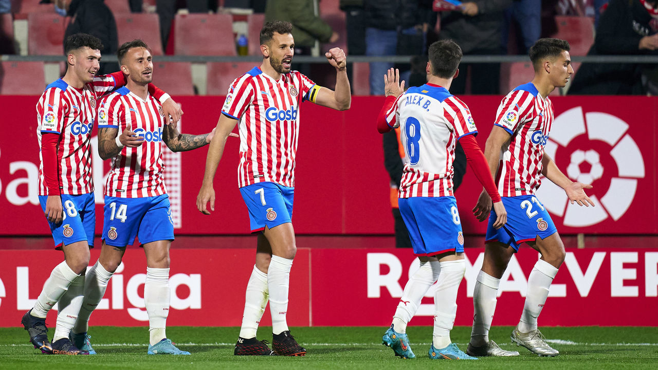 GIRONA, SPAIN - MARCH 06: Players of Girona FC celebrating their team's first goal during the La Liga Smartbank match between Girona FC and Real Oviedo at Montilivi Stadium on March 06, 2022 in Girona, Spain.