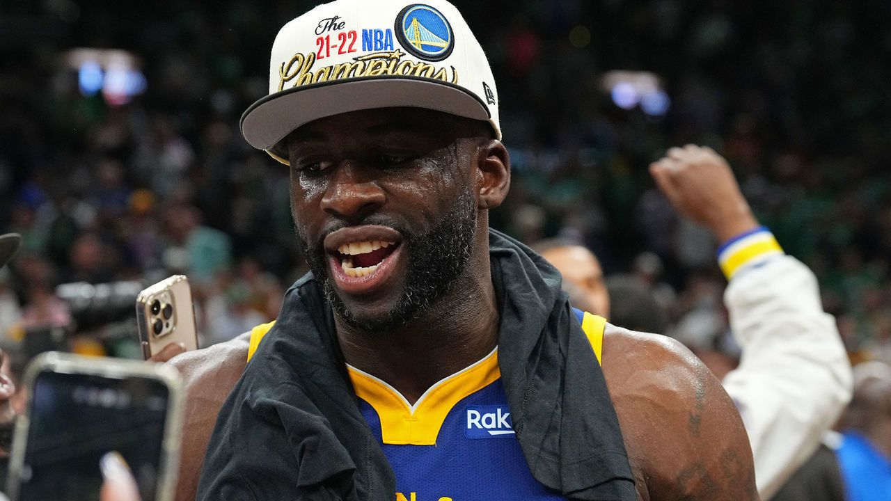 BOSTON, MA - JUNE 16: Draymond Green #23 of the Golden State Warriors smiles and celebrates on stage after winning Game Six of the 2022 NBA Finals against the Boston Celtics on June 16, 2022 at TD Garden in Boston, Massachusetts. NOTE TO USER: User expressly acknowledges and agrees that, by downloading and or using this photograph, user is consenting to the terms and conditions of Getty Images License Agreement. Mandatory Copyright Notice: Copyright 2022 NBAE