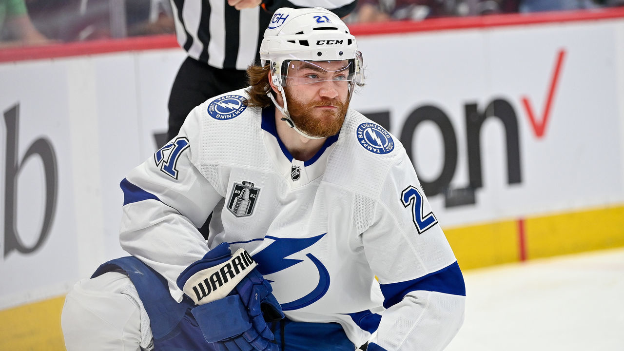 DENVER, CO - JUNE 15: Tampa Bay Lightning center Brayden Point (21) reacts after drawing a penalty after taking a stick to the face during a Stanley Cup Finals game between the Tampa Bay Lightning and the Colorado Avalanche at Ball Arena in Denver, Colorado on June 15, 2022.