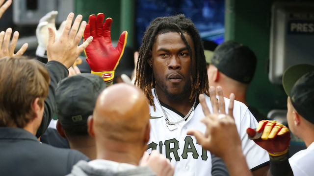 PITTSBURGH, PA - JUNE 20: Oneil Cruz #15 of the Pittsburgh Pirates celebrates after scoring on a sacrifice fly in the second inning against the Chicago Cubs during the game at PNC Park on June 20, 2022 in Pittsburgh, Pennsylvania.