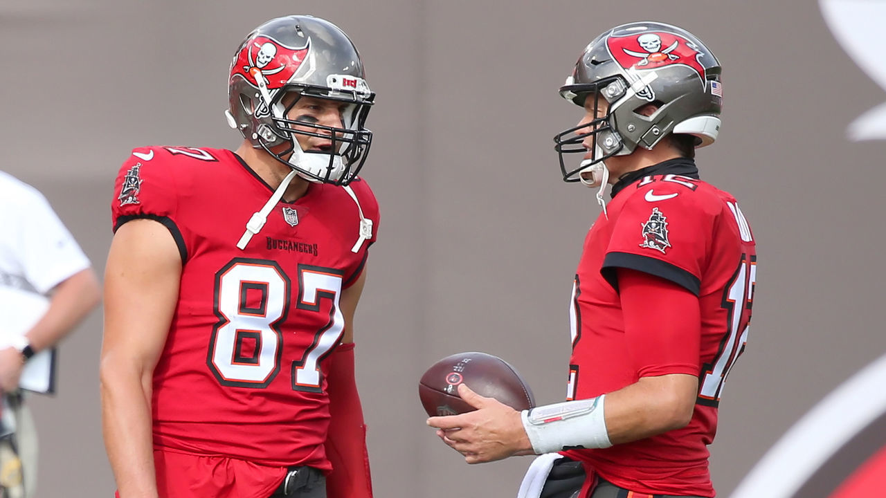 TAMPA, FL - DECEMBER 13: Rob Gronkowski (87) of the Bucs talks with Tom Brady (12) before the regular season game between the Minnesota Vikings and the Tampa Bay Buccaneers on December 13, 2020 at Raymond James Stadium in Tampa, Florida.