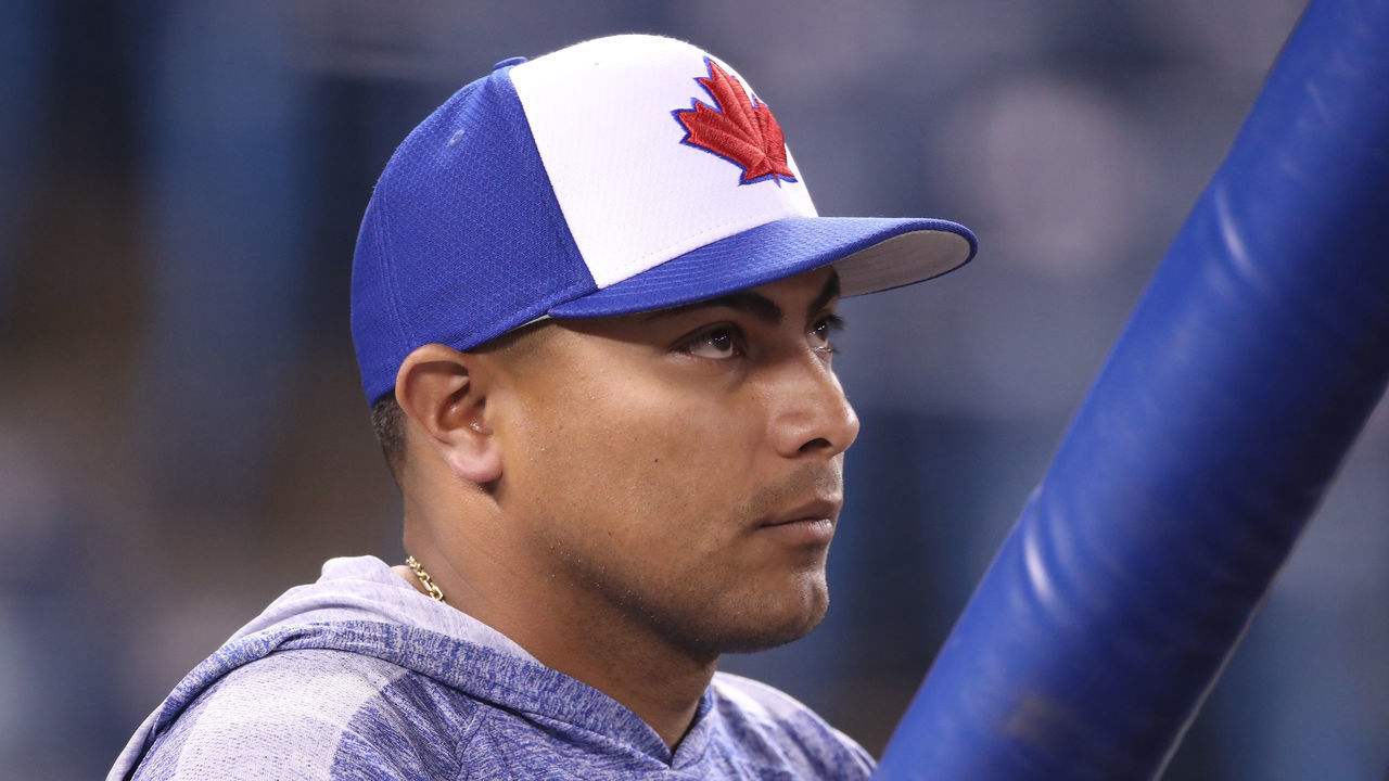 TORONTO, ON - MARCH 30: Hitting coach Guillermo Martinez #16 of the Toronto Blue Jays looks on during batting practice before the start of MLB game action against the Detroit Tigers at Rogers Centre on March 30, 2019 in Toronto, Canada.