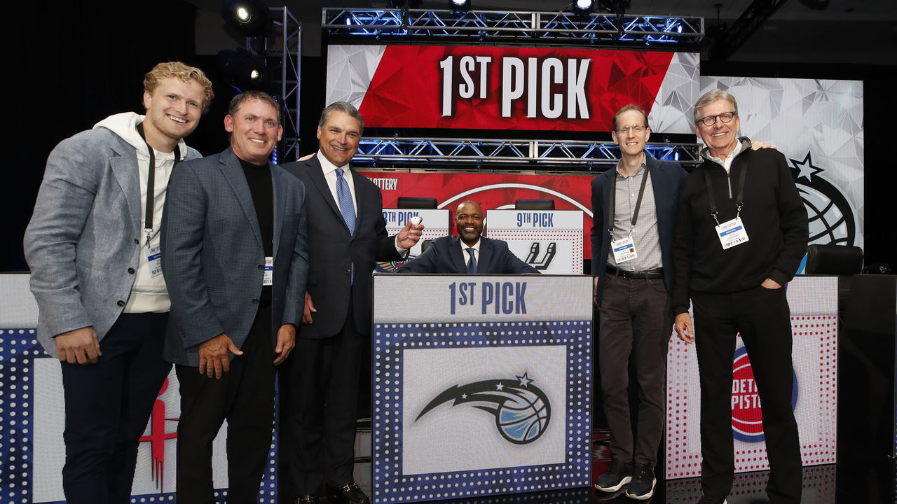 CHICAGO,IL - MAY 17: Head Coach Jamahl Mosley of the Orland Magic, President of Basketball Operations, Jeff Weltman, General Manager John Hammond and the Orlando Magic front office smile for a photo after they get the 1st overall pick in the NBA Draft during the 2022 NBA Draft Lottery at McCormick Place on May 17, 2022 in Chicago, Illinois. Mandatory Copyright Notice: Copyright 2022 NBAE