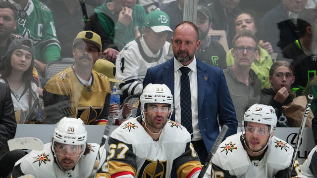 DALLAS, TX - APRIL 26: Pete DeBoer of the Vegas Golden Knights watches the action from behind the bench against the Dallas Stars at the American Airlines Center on April 26, 2022 in Dallas, Texas.