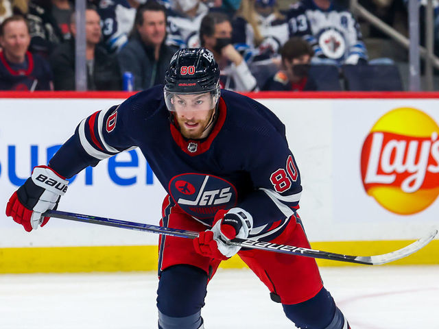 WINNIPEG, MB - APRIL 02: Pierre-Luc Dubois #80 of the Winnipeg Jets follows the play up the ice during first period action against the Los Angeles Kings at Canada Life Centre on April 02, 2022 in Winnipeg, Manitoba, Canada.