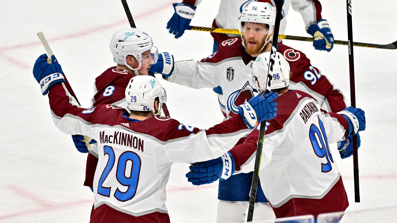 TAMPA, FLORIDA - JUNE 22: Gabriel Landeskog #92 of the Colorado Avalanche celebrates with teammates after scoring a goal against Andrei Vasilevskiy #88 of the Tampa Bay Lightning during the second period in Game Four of the 2022 NHL Stanley Cup Final at Amalie Arena on June 22, 2022 in Tampa, Florida.