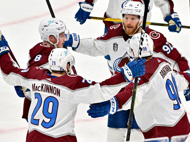TAMPA, FLORIDA - JUNE 22: Gabriel Landeskog #92 of the Colorado Avalanche celebrates with teammates after scoring a goal against Andrei Vasilevskiy #88 of the Tampa Bay Lightning during the second period in Game Four of the 2022 NHL Stanley Cup Final at Amalie Arena on June 22, 2022 in Tampa, Florida.
