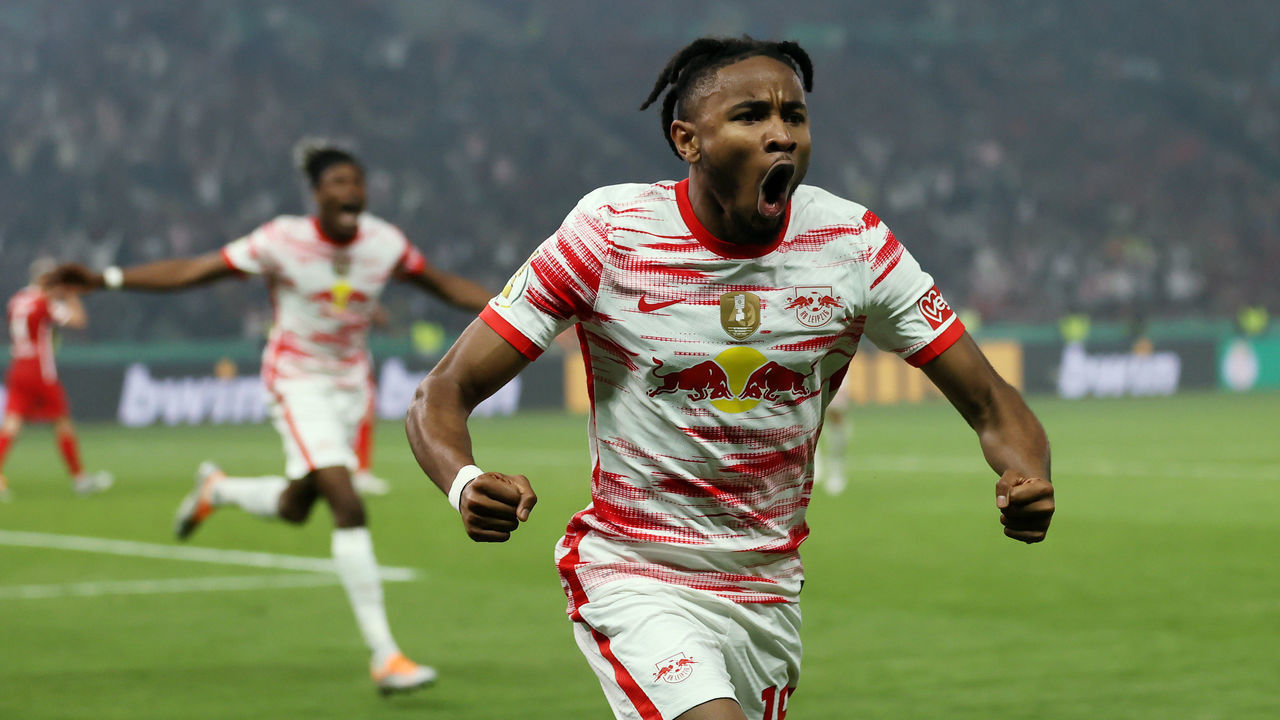 BERLIN, GERMANY - MAY 21: Christopher Nkunku of RB Leipzig celebrates after scoring their side's first goal during the final match of the DFB Cup 2022 between SC Freiburg and RB Leipzig at Olympiastadion on May 21, 2022 in Berlin, Germany.