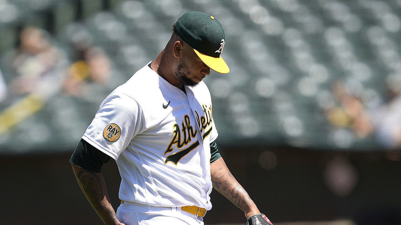 OAKLAND, CALIFORNIA - JUNE 23: Frankie Montas #47 of the Oakland Athletics reacts walking back to the mound with his head down after giving up his first hit of the game in the top of the eighth inning against the Seattle Mariners at RingCentral Coliseum on June 23, 2022 in Oakland, California.