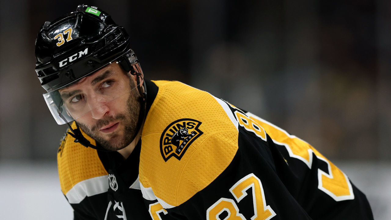 BOSTON, MASSACHUSETTS - APRIL 14: Patrice Bergeron #37 of the Boston Bruins looks on during the first period against the Ottawa Senators at TD Garden on April 14, 2022 in Boston, Massachusetts.