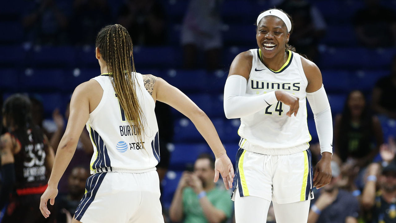 ARLINGTON, TX - JUNE 23: Arike Ogunbowale #24 of the Dallas Wings smiles during the game against the Indiana Fever on June 23, 2022 at the College Park Center in Arlington, TX. Mandatory Copyright Notice: Copyright 2022 NBAE