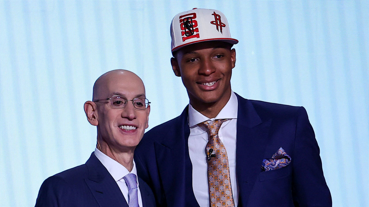 NEW YORK, NY, USA - JUNE 23: Jabari Smith Jr. poses for a photo with NBA Commissioner, Adam Silver (L) after being selected number three overall by the Houston Rockets during the 2022 NBA Draft on June 23, 2022 at Barclays Center in Brooklyn, New York, United States.