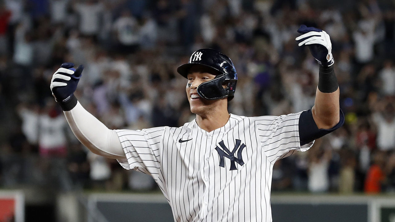 NEW YORK, NEW YORK - JUNE 23: Aaron Judge #99 of the New York Yankees celebrates his ninth inning game winning base hit against the Houston Astros at Yankee Stadium on June 23, 2022 in New York City.