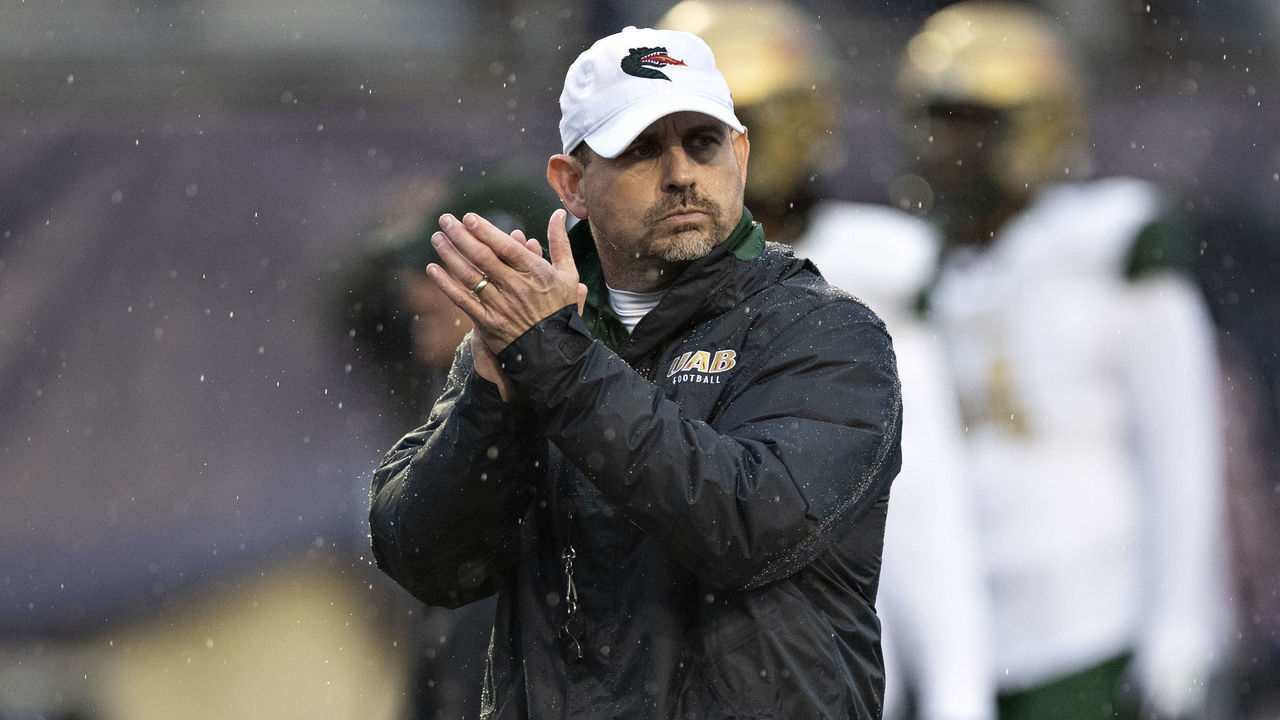 SHREVEPORT, LOUISIANA - DECEMBER 18: Head Coach Bill Clark of the UAB Blazers watches his team warm up before a game against the BYU Cougars during the Radiance Technologies Independence Bowl at Independence Stadium on December 18, 2021 in Shreveport, Louisiana.