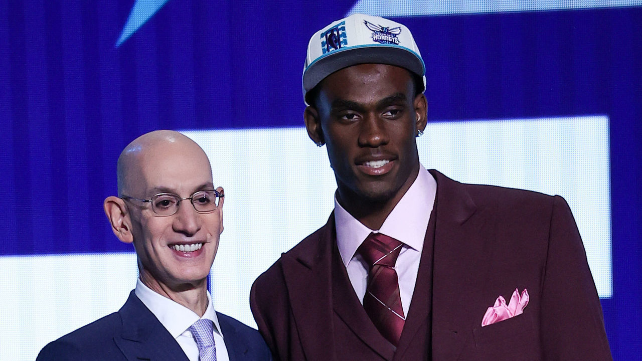 NEW YORK, NY - JUNE 23: Jalen Duren shakes hands with NBA Commissioner, Adam Silver (L) after being selected No. 13 overall by Charlotte Hornets and traded to New York Knicks during the 2022 NBA Draft on June 23, 2022 at Barclays Center in Brooklyn, New York, United States.