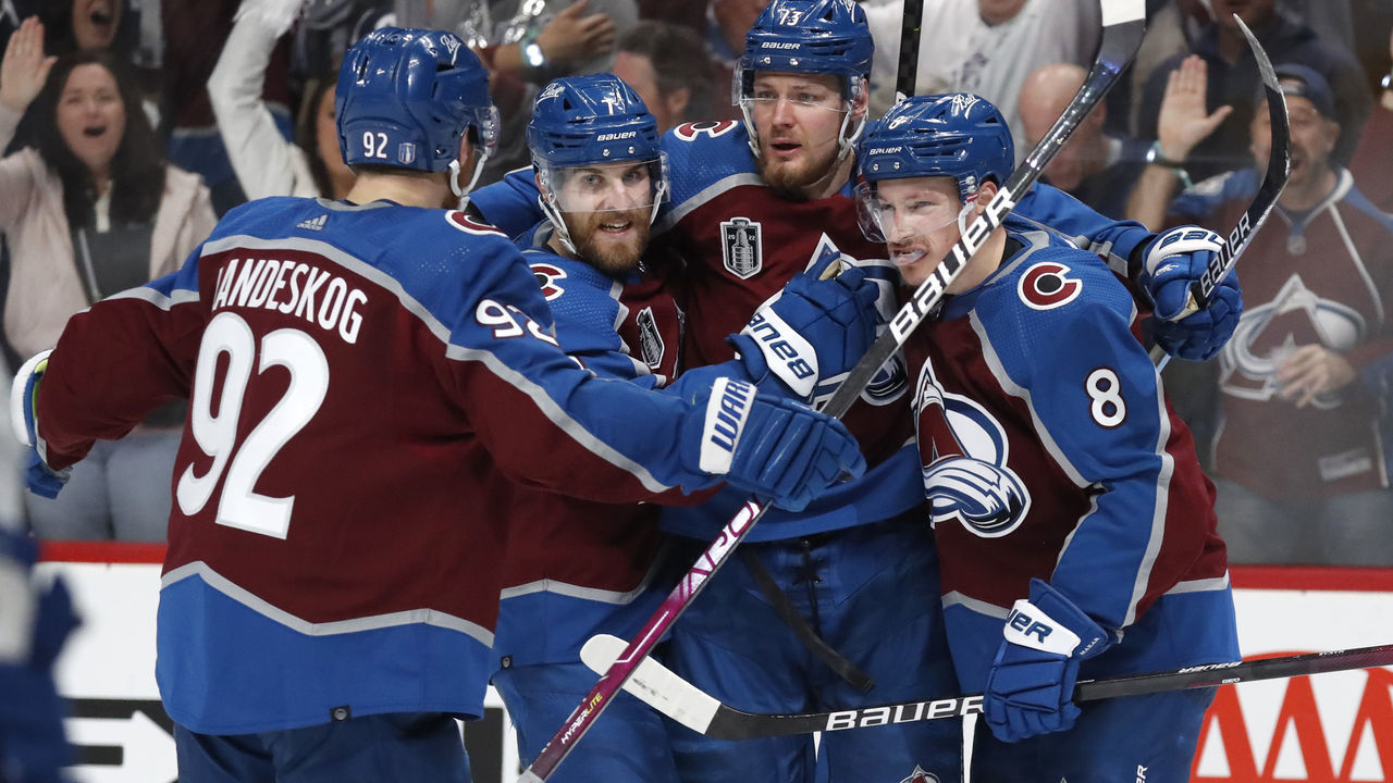 DENVER, COLORADO - JUNE 24: (L-R) Gabriel Landeskog #92, Devon Toews #7, Valeri Nichushkin #13 and Cale Makar #8 of the Colorado Avalanche celebrate a goal against the Tampa Bay Lightning in the third period of Game Five of the 2022 Stanley Cup Final at Ball Arena on June 24, 2022 in Denver.