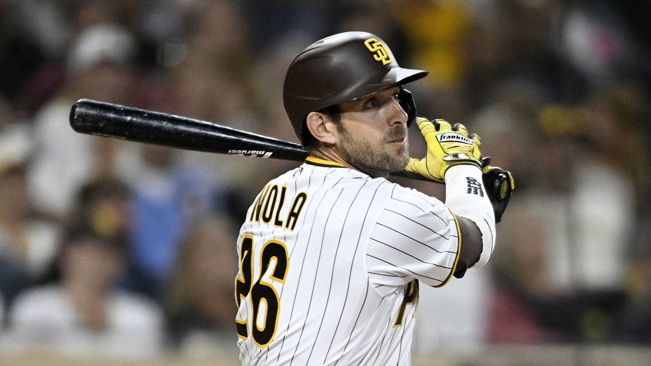 SAN DIEGO, CA - JUNE 24: Austin Nola #26 of the San Diego Padres hits an RBI single during the sixth inning of a baseball game against the Philadelphia Phillies at Petco Park on June 24, 2022 in San Diego, California.