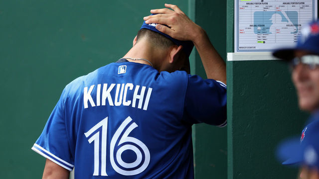 KANSAS CITY, MISSOURI - JUNE 08: Starting pitcher Yusei Kikuchi of Japan #16 of the Toronto Blue Jays walks out of the dugout after being pulled during the 1st inning of the game against the Kansas City Royals at Kauffman Stadium on June 08, 2022 in Kansas City, Missouri.