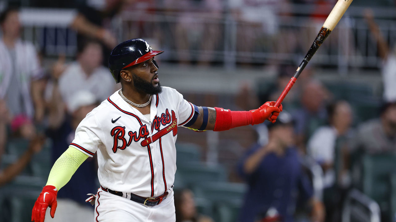 ATLANTA, GA - JUNE 25: Marcell Ozuna #20 of the Atlanta Braves hits a two run home run during the eighth inning against the Los Angeles Dodgers at Truist Park on June 25, 2022 in Atlanta, Georgia.