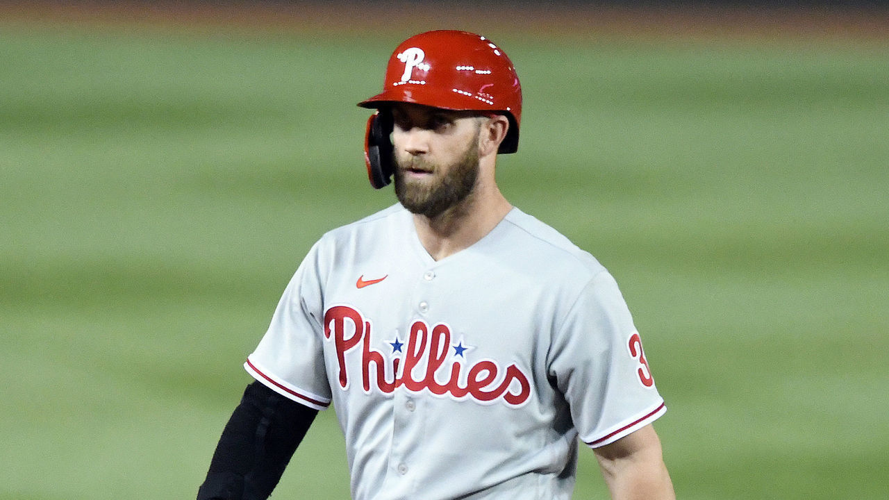 WASHINGTON, DC - JUNE 16: Bryce Harper #3 of the Philadelphia Phillies walks back to the dug out during a baseball game against the Washington Nationals at Nationals Park on June 16, 2022 in Washington, DC.