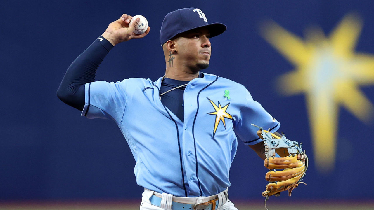 TAMPA, FL - MAY 27: Wander Franco #5 of the Tampa Bay Rays throws to first base for the out during the game between the New York Yankees and the Tampa Bay Rays at Tropicana Field on Friday, May 27, 2022 in Tampa, Florida.