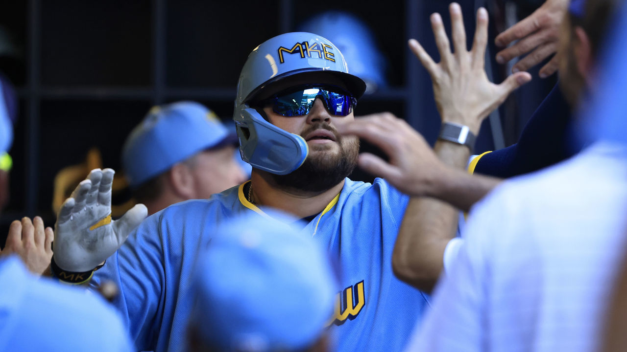 MILWAUKEE, WISCONSIN - JUNE 26: Rowdy Tellez #11 of the Milwaukee Brewers celebrates with teammates after hitting a two run homerun during the first inning in the game against the Toronto Blue Jays at American Family Field on June 26, 2022 in Milwaukee, Wisconsin.