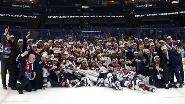 TAMPA, FLORIDA - JUNE 26: The Colorado Avalanche pose for a team photo after defeating the Tampa Bay Lightning in Game Six of the 2022 Stanley Cup Final at Amalie Arena on June 26, 2022 in Tampa, Florida. The Colorado Avalanche defeated the Tampa Bay Lightning 2-1 in Game Six to take the best of seven Stanley Cup Final series 4 games to 2.