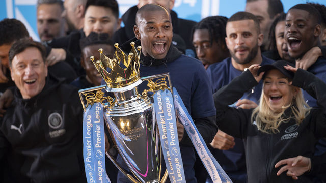 MANCHESTER, ENGLAND - MAY 23: Fernandinho of Manchester City with the Premier LEague trophy during the Manchester City FC Victory Parade on May 23, 2022 in Manchester, England.