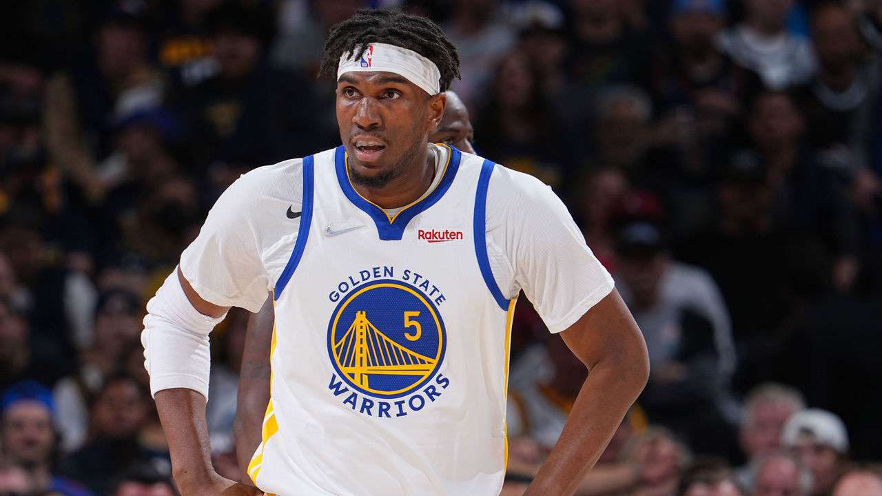 DENVER, CO - APRIL 21: Kevon Looney #5 of the Golden State Warriors looks on during the game against the Denver Nuggets during Round 1 Game 3 of the 2022 NBA Playoffs on April 21, 2022 at the Ball Arena in Denver, Colorado. NOTE TO USER: User expressly acknowledges and agrees that, by downloading and/or using this Photograph, user is consenting to the terms and conditions of the Getty Images License Agreement. Mandatory Copyright Notice: Copyright 2022 NBAE