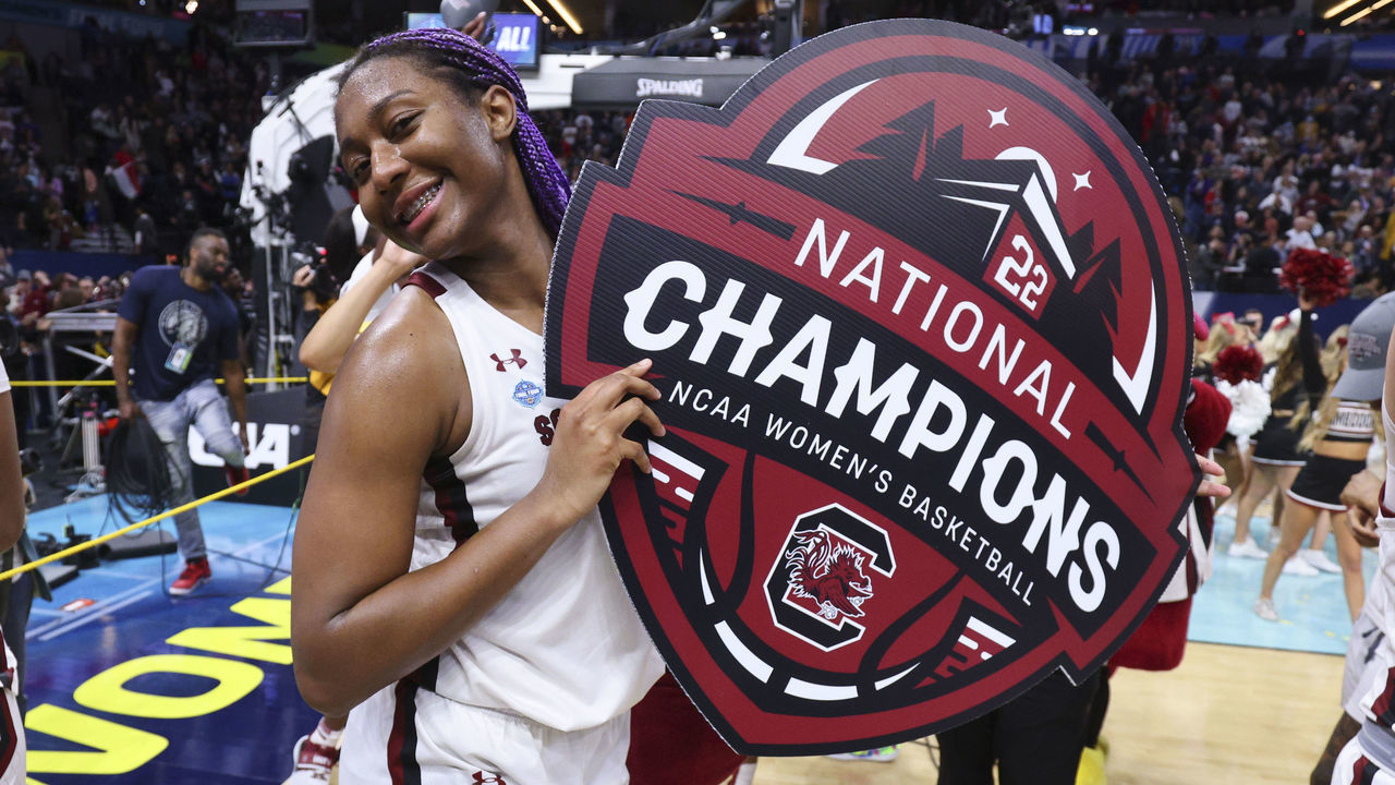MINNEAPOLIS, MN - APRIL 03: Aliyah Boston #4 of the South Carolina Gamecocks celebrates after defeating the UConn Huskies during the championship game of the NCAA Women’s Basketball Tournament at Target Center on April 3, 2022 in Minneapolis, Minnesota.