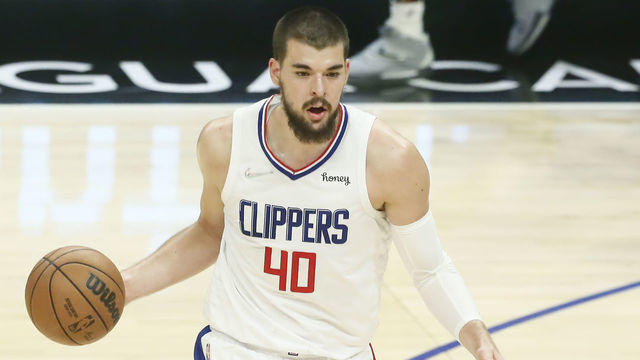 LOS ANGELES, CA - APRIL 3: Ivica Zubac #40 of the LA Clippers dribbles the ball during a game at the Crypto.com Arena on April 3, 2022 in Los Angeles, California. Mandatory Credit: 2022 NBAE