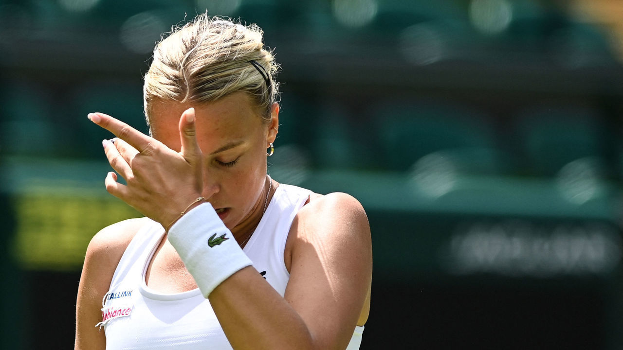 Estonia's Anett Kontaveit reacts as she plays against Jule Niemeier during their women's singles tennis match on the third day of the 2022 Wimbledon Championships at The All England Tennis Club in Wimbledon, southwest London, on June 29, 2022. - RESTRICTED TO EDITORIAL USE