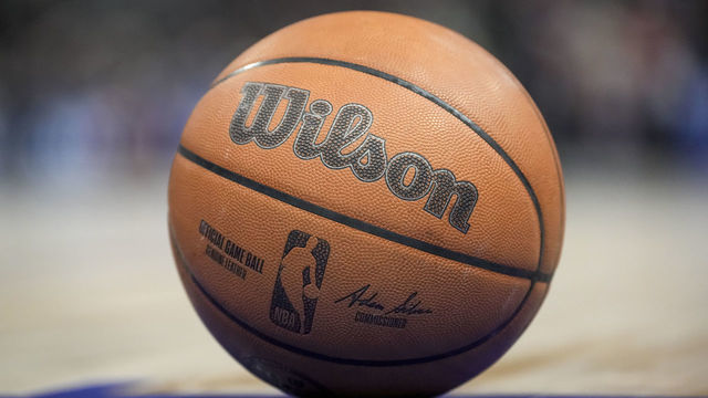 DETROIT, MICHIGAN - MARCH 31: The NBA logo is pictured on a Wilson brand basketball during the game between the Detroit Pistons and Philadelphia 76ers Little Caesars Arena on March 31, 2022 in Detroit, Michigan.