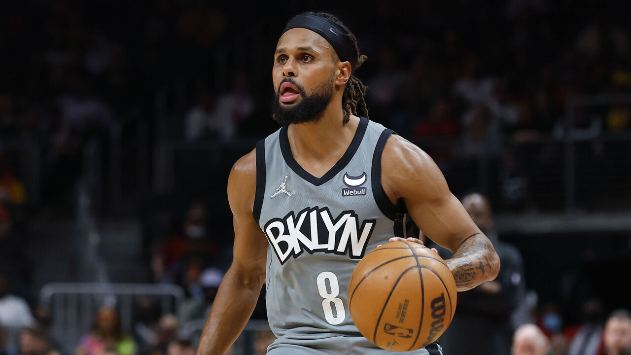 ATLANTA, GA - APRIL 02: Patty Mills #8 of the Brooklyn Nets sets up a shot during the first half against the Atlanta Hawks at State Farm Arena on April 2, 2022 in Atlanta, Georgia.