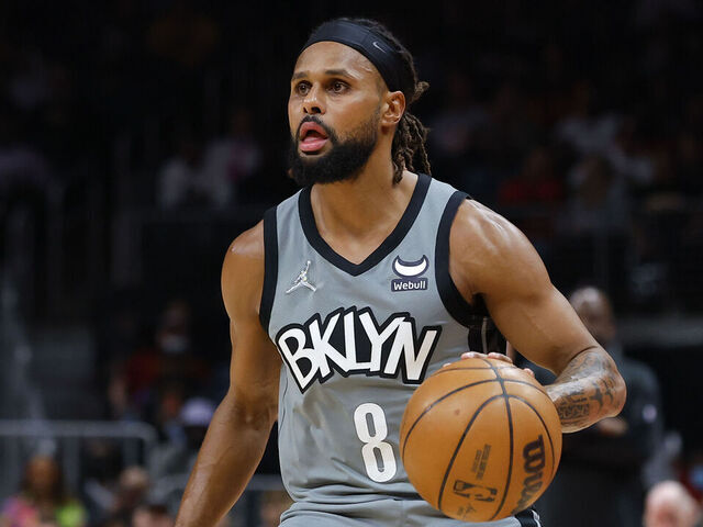 ATLANTA, GA - APRIL 02: Patty Mills #8 of the Brooklyn Nets sets up a shot during the first half against the Atlanta Hawks at State Farm Arena on April 2, 2022 in Atlanta, Georgia.