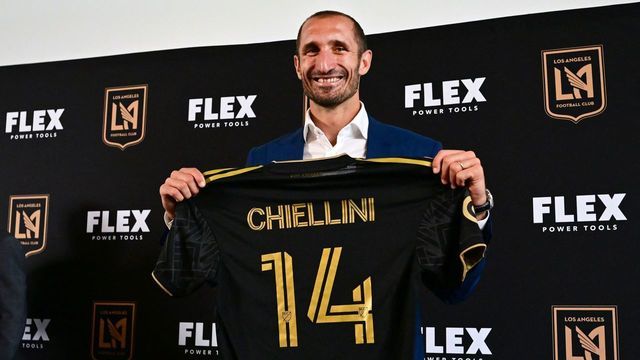 Giorgio Chiellini poses with his jersey at a press conference introducing his arrival to Major League Soccer club Los Angeles FC (LAFC) on June 29, 2022 in Los Angeles. - The former Juventus defender joins LAFC on July 1.