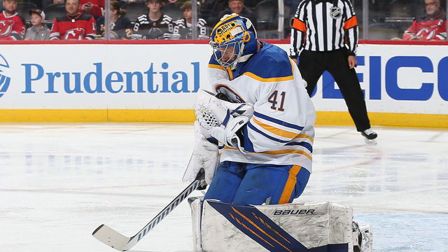 NEWARK, NJ - APRIL 21: Craig Anderson #41 of the Buffalo Sabres makes a save against the New Jersey Devils at Prudential Center on April 21, 2022 in Newark, New Jersey.