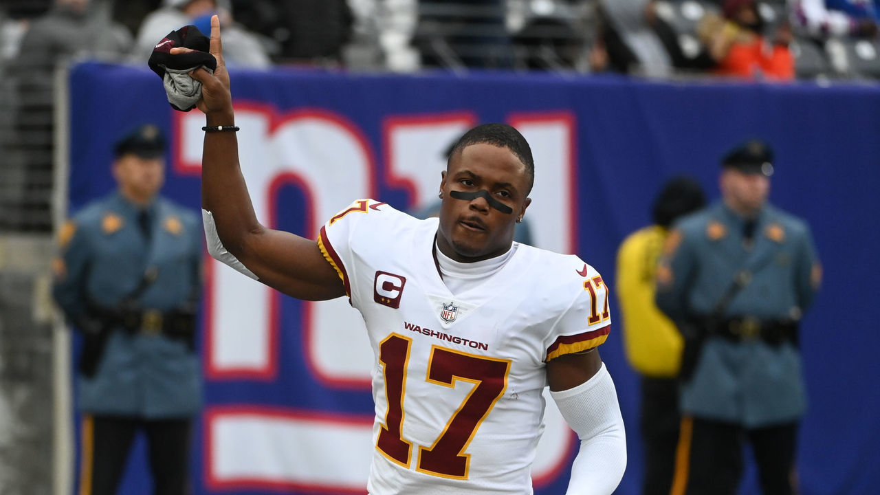 EAST RUTHERFORD, NJ - JANUARY 9: Washington Football Team wide receiver Terry McLaurin (17) waves to fans as he takes the field before the game between the Washington Football Team and the New York Giants at MetLife Stadium on Sunday, January 9, 2022.