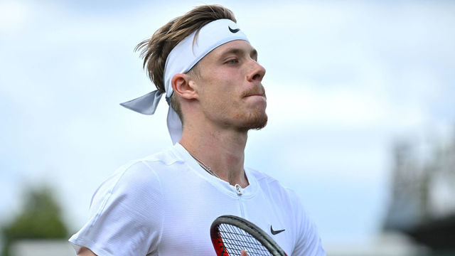 Canada's Denis Shapovalov prepares to return the ball to US Brandon Nakashima during their men's singles tennis match on the fourth day of the 2022 Wimbledon Championships at The All England Tennis Club in Wimbledon, southwest London, on June 30, 2022. - RESTRICTED TO EDITORIAL USE