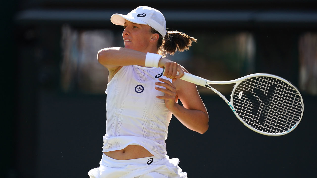 Iga Swiatek in action during her Ladies singles second round match against Lesley Pattinama Kerkhove during day four of the 2022 Wimbledon Championships at the All England Lawn Tennis and Croquet Club, Wimbledon. Picture date: Thursday June 30, 2022.