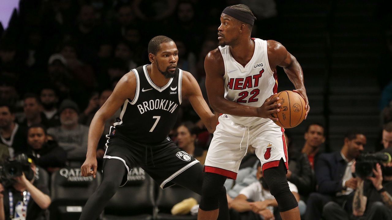 NEW YORK, NEW YORK - OCTOBER 27: (NEW YORK DAILIES OUT) Jimmy Butler #22 of the Miami Heat in action against Kevin Durant #7 of the Brooklyn Nets at Barclays Center on October 27, 2021 in New York City. The Heat defeated the Nets 106-93.